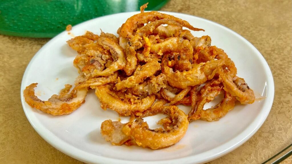 Salted egg yolk fried squid tentacles at Xingyuan Restaurant in Guangzhou